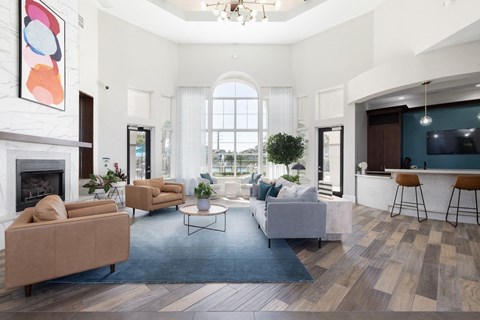 a living room with two couches and a fireplace
